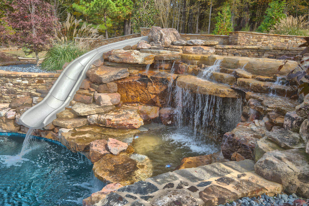 Featured image for “Lakeland Custom Swimming Pool / Slide / Grotto And Landscaping Project”
